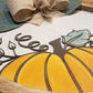 Autumn Pumpkin with Bow and Greenery